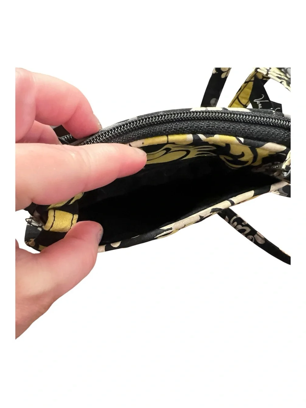 Vera Bradley Mini Hipster Floral Crossbody Bag in Black in “Baroque” pattern.